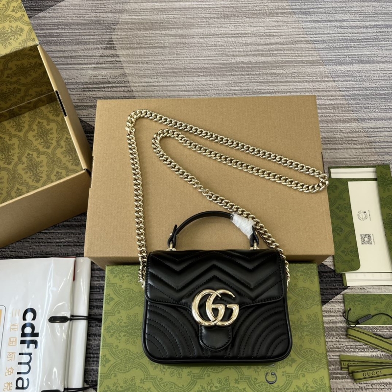 G*u*i top handle bags